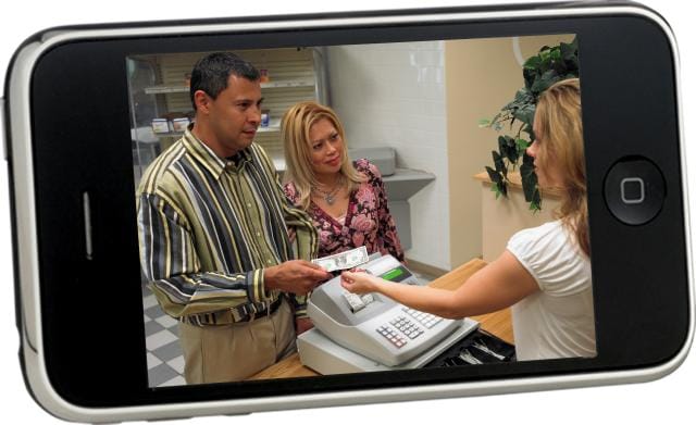 Image of a smartphone screen displaying a man and woman at a store checkout, with the man handing cash to a cashier. This secure transaction is monitored through Total Connect, ensuring the highest level of security for Premier Security users.