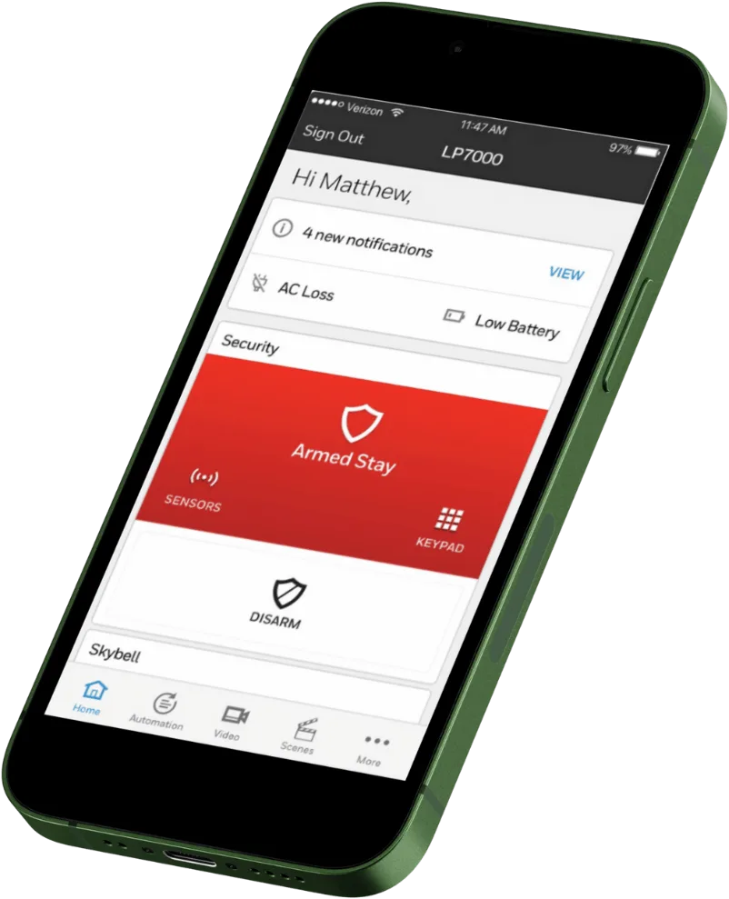 A smartphone displaying the Resideo Total Connect home security app interface with notifications and options to view AC loss, low battery, and armed stay mode.