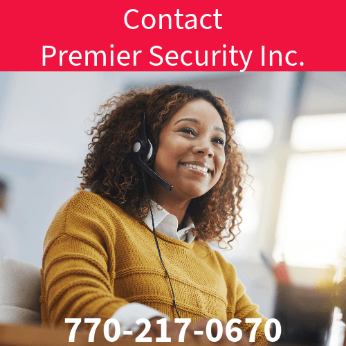 Smiling person with a headset at a call center, text reads "Contact Premier Security Inc. 770-217-0670 to make a payment.