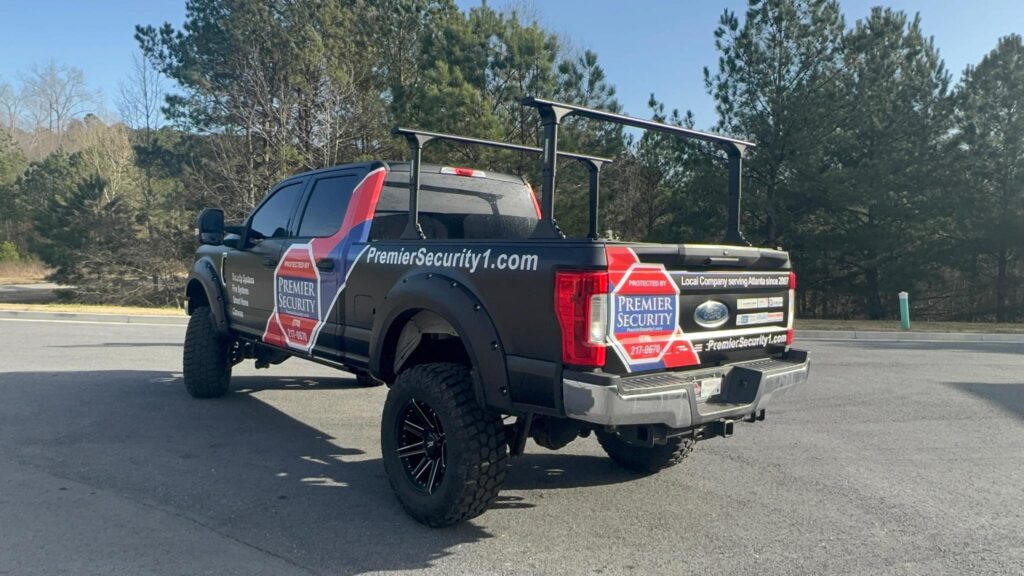 Premier Security Inc. service truck parked in Marietta GA, promoting local security system installation services